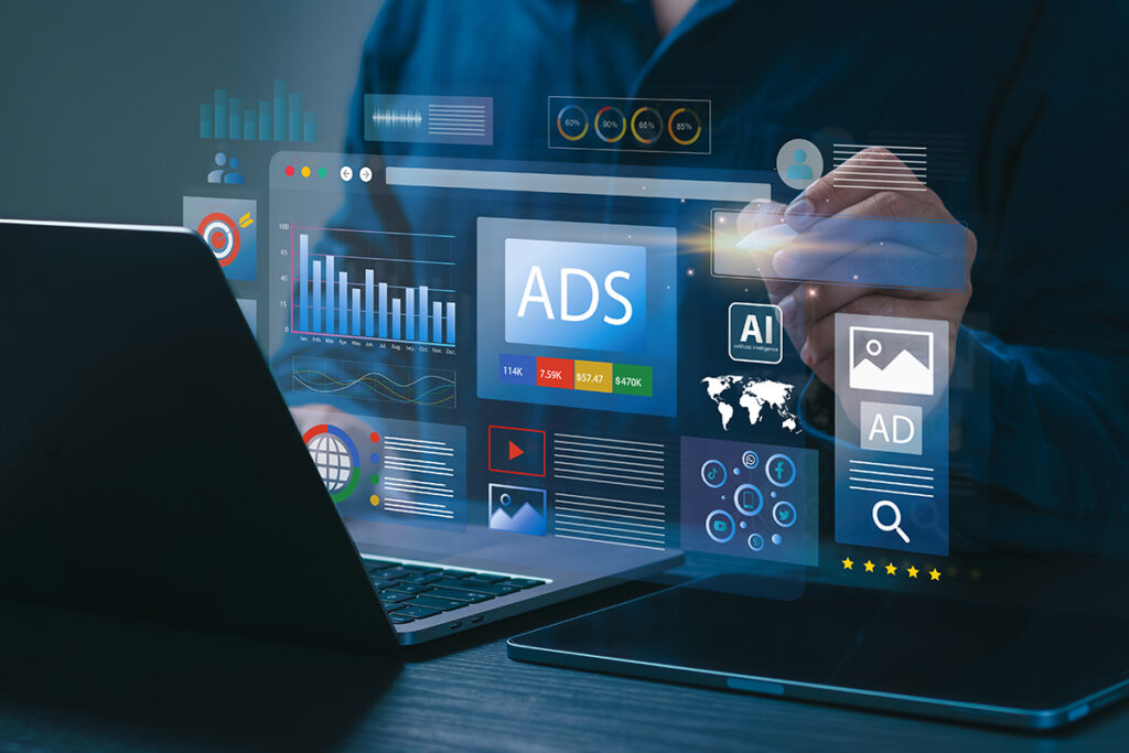 person on laptop with paid search ads icons