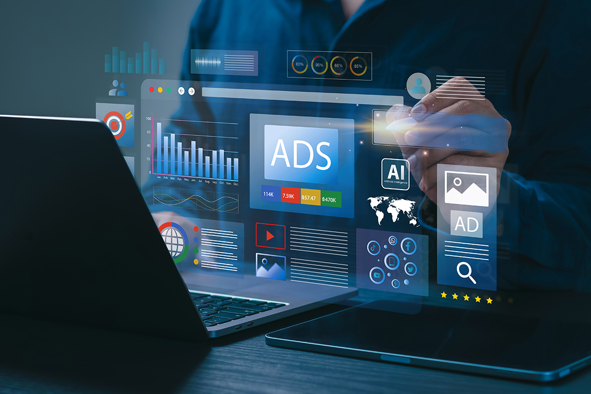 person on laptop with paid search ads icons